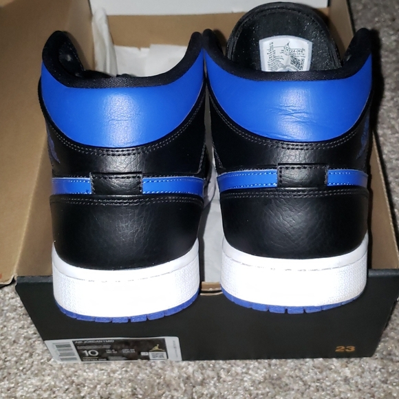 nipsey blue jordans